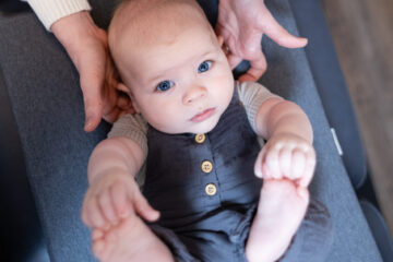 An infant receiving gentle care at the clinic